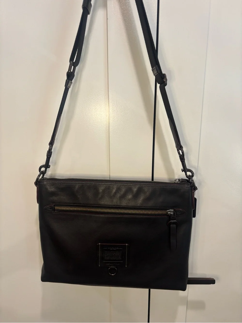 Coach dark brown Leather Messenger Pouch with Gold-Tone Zip